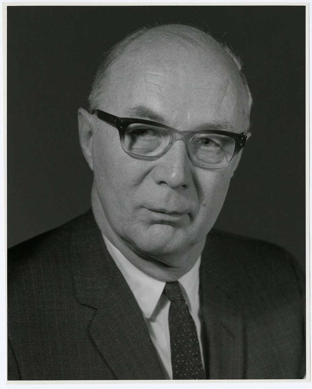 Black and white photo of Burton Paulu.